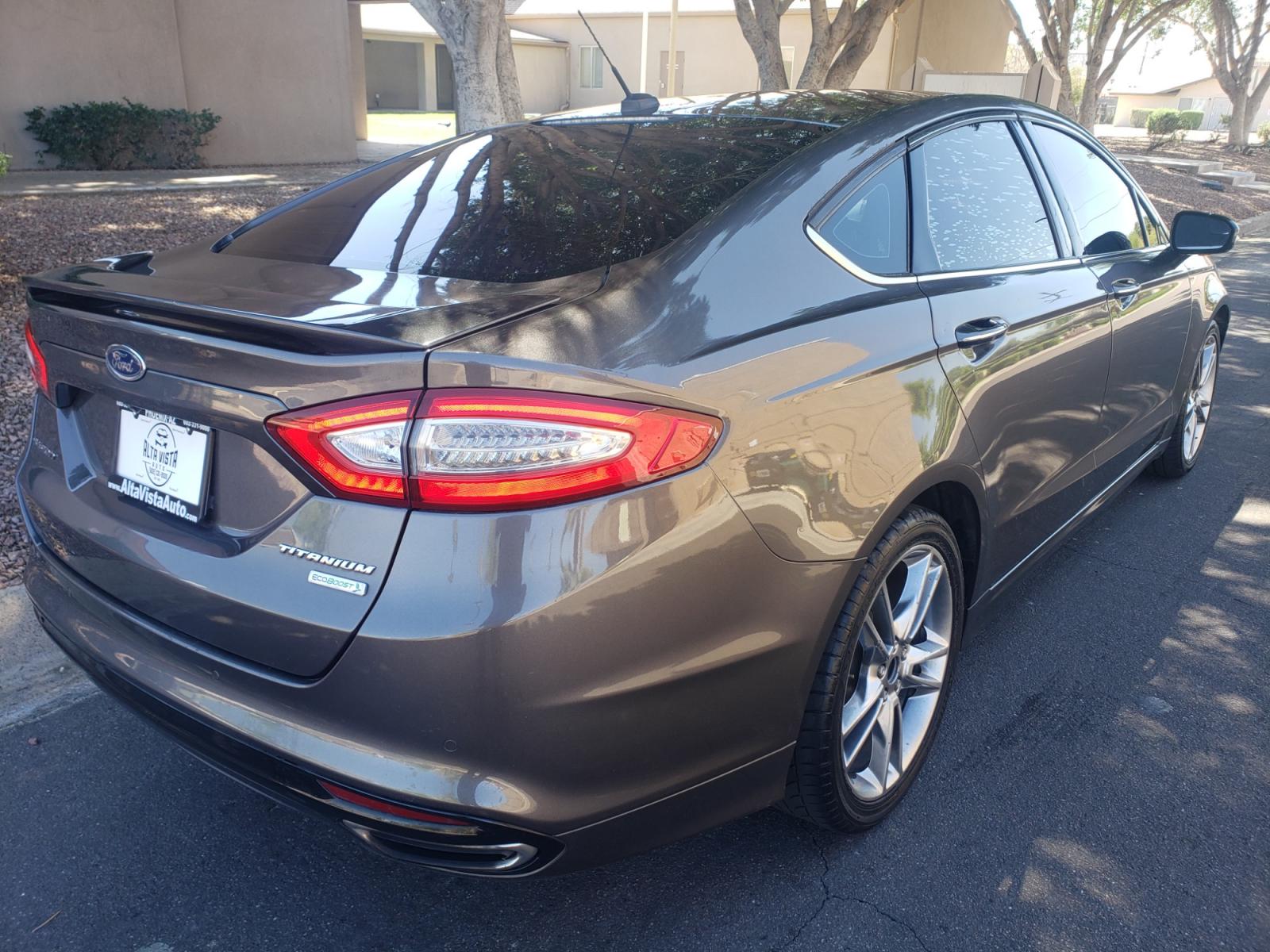 2016 /gray and black Ford Fusion titanium (3FA6P0K99GR) with an 2.0L L4 DOHC 16V engine, 4-Speed Automatic transmission, located at 323 E Dunlap Ave., Phoenix, AZ, 85020, (602) 331-9000, 33.567677, -112.069000 - Photo #3